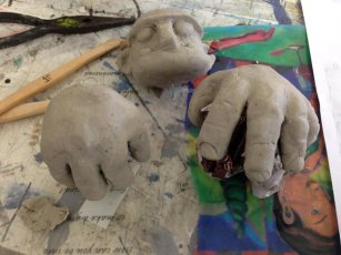 big hands also made from paper clay